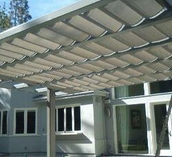 outdoor with white slide on wire retractable awning - custom awnings - custom awnings near me - custom awnings for decks - custom awnings for business - custom door awnings near me - spear awnings - aluminum awnings - dome awnings