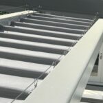 outdoor with white slide on wire retractable awning - custom awnings - custom awnings near me - custom awnings for decks - custom awnings for business - custom door awnings near me - spear awnings - aluminum awnings - dome awnings