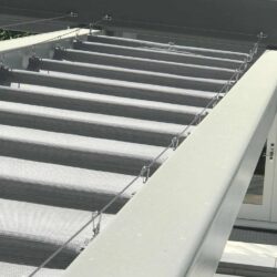 outdoor with white slide on wire retractable awning - custom awnings - custom awnings near me - custom awnings for decks - custom awnings for business - custom door awnings near me - spear awnings - aluminum awnings - dome awnings