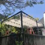 slide on wire retractable awnings for patio - custom awnings - custom awnings near me - custom awnings for decks - custom awnings for business - custom door awnings near me - spear awnings - aluminum awnings - dome awnings