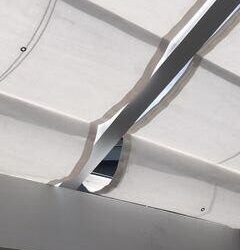 garden with white awning - custom awnings - custom awnings near me - custom awnings for decks - custom awnings for business - custom door awnings near me - spear awnings - aluminum awnings - dome awnings