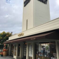 store front brown awnings for Farmers Market - concave awnings - aluminum awnings - carports - store front awnings - patio shades