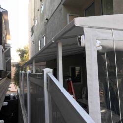 apartment with an aluminum awning - custom awnings - custom awnings near me - custom awnings for decks - custom awnings for business - custom door awnings near me - spear awnings - aluminum awnings - dome awnings