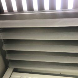 a room with roll up curtains - custom awnings - custom awnings near me - custom awnings for decks - custom awnings for business - custom door awnings near me - spear awnings - aluminum awnings - dome awnings