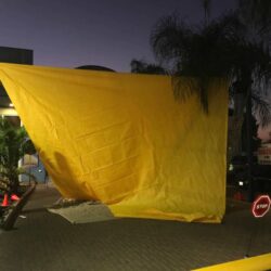 outdoor space with yellow sail shade - custom awnings - custom awnings near me - custom awnings for decks - custom awnings for business - custom door awnings near me - spear awnings - aluminum awnings - dome awnings