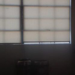 a room with roll up curtains - custom awnings - custom awnings near me - custom awnings for decks - custom awnings for business - custom door awnings near me - spear awnings - aluminum awnings - dome awnings