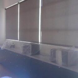 a room with roll up curtains - custom awnings - custom awnings near me - custom awnings for decks - custom awnings for business - custom door awnings near me - spear awnings - aluminum awnings - dome awnings