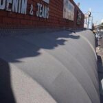 stores with black dome awnings - custom awnings - custom awnings near me - custom awnings for decks - custom awnings for business - custom door awnings near me - spear awnings - aluminum awnings - dome awnings